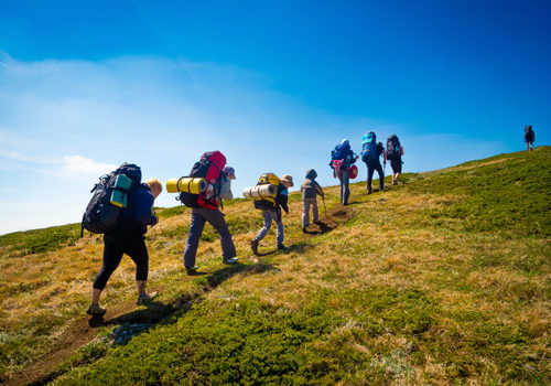 Hikers group trekking in Crimea mountains